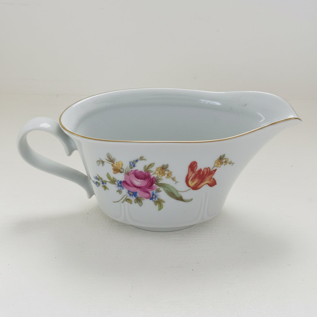 Floral gravy boat made in Germany Point 12 LBS 8 in length 4 inches wide 3 1/4 inches tall