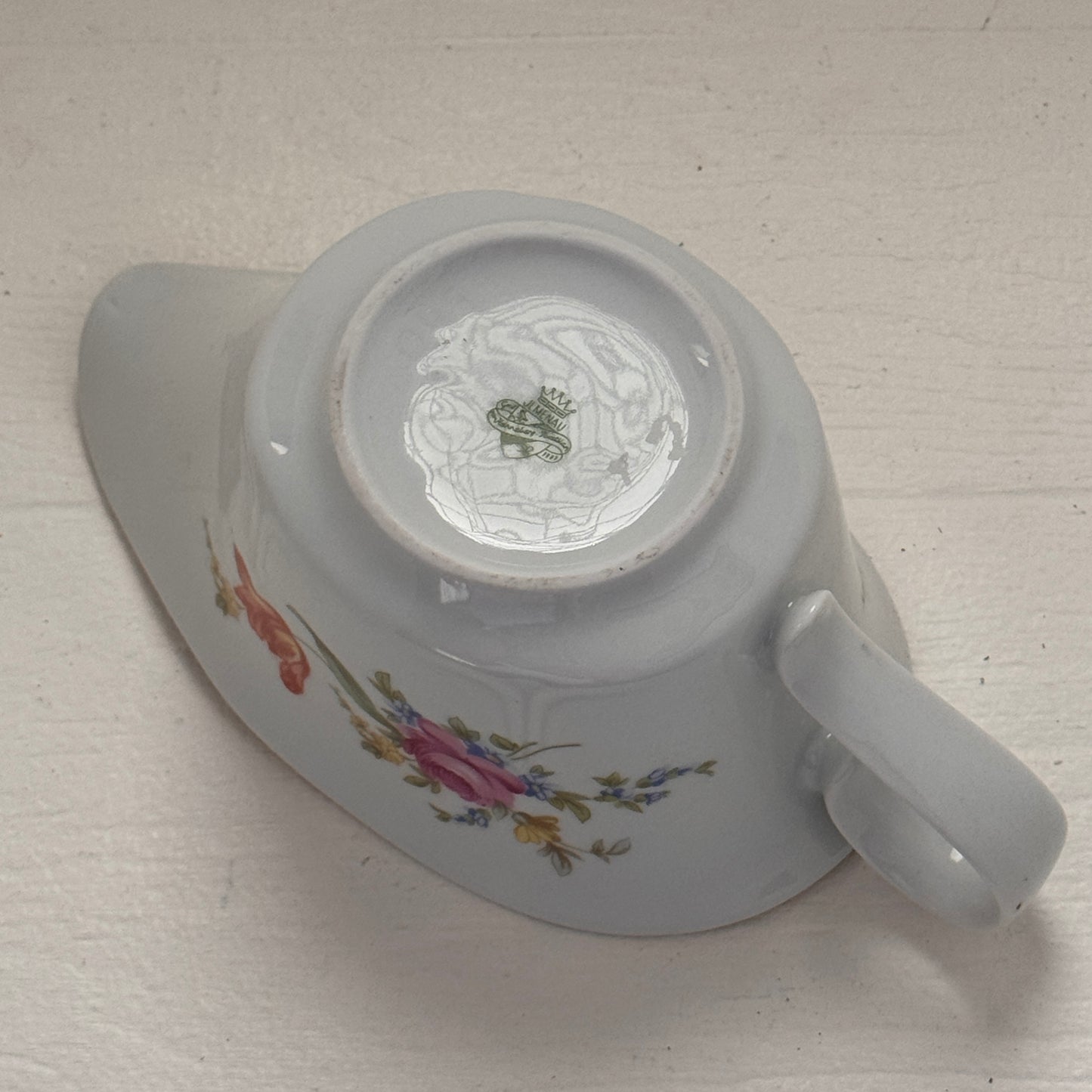 Floral gravy boat made in Germany Point 12 LBS 8 in length 4 inches wide 3 1/4 inches tall